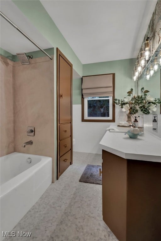 full bathroom featuring toilet, vanity, and shower / tub combination