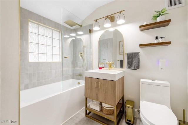 bathroom featuring toilet, bathing tub / shower combination, vanity, visible vents, and tile patterned floors