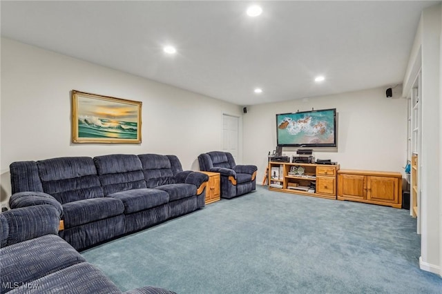 carpeted living area featuring recessed lighting