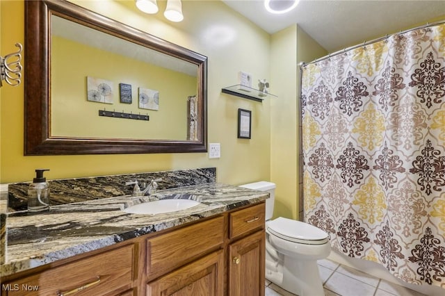 full bath with toilet, curtained shower, vanity, and tile patterned floors