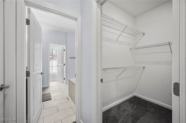 10565 Valley View Rd, Sagamore Hills, OH 44067 - walk in closet featuring tile patterned floors