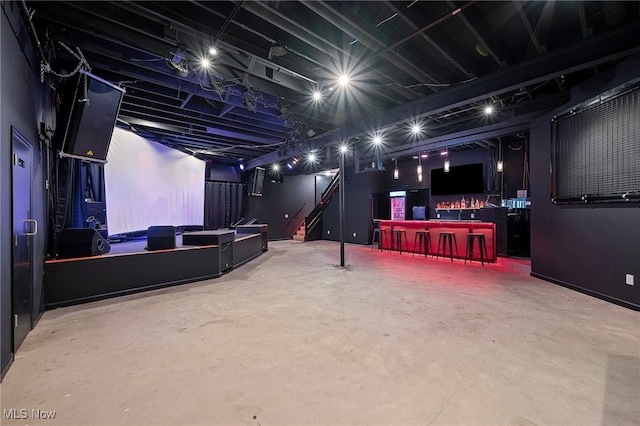 10565 Valley View Rd, Sagamore Hills, OH 44067 - home theater with a bar and concrete flooring