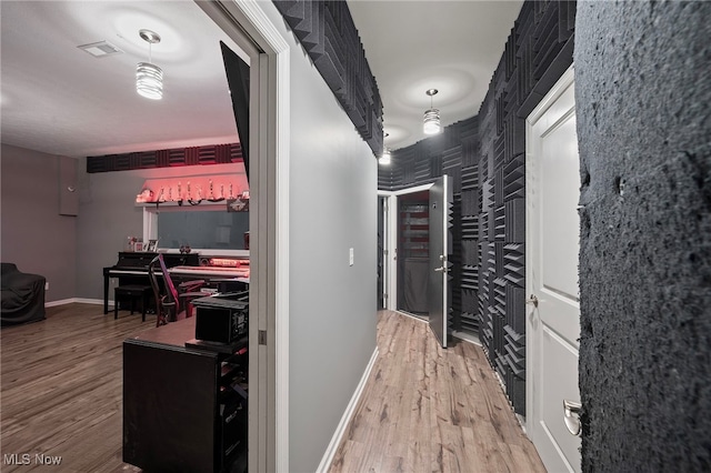 10565 Valley View Rd, Sagamore Hills, OH 44067 - hallway with wood finished floors and baseboards