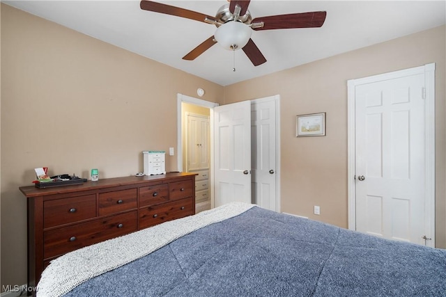 bedroom featuring ceiling fan