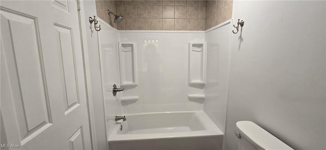 bathroom featuring toilet and bathtub / shower combination