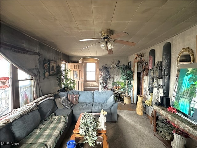 living room featuring ceiling fan