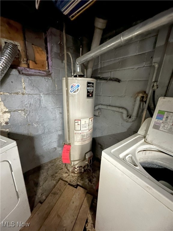 laundry room featuring laundry area, washer / clothes dryer, and gas water heater