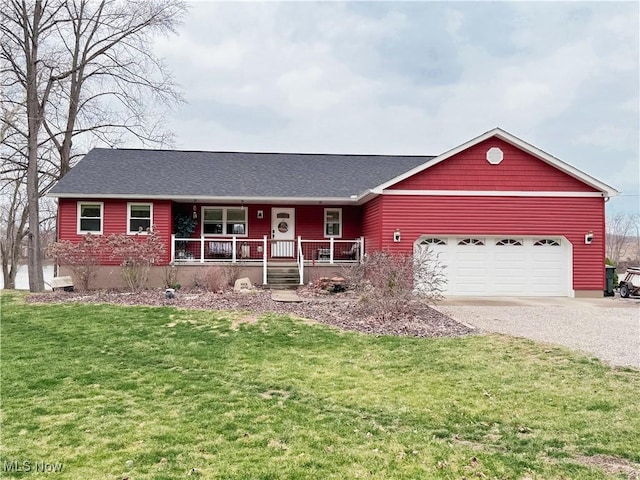 ranch-style house with gravel driveway, roof with shingles, covered porch, a front yard, and a garage