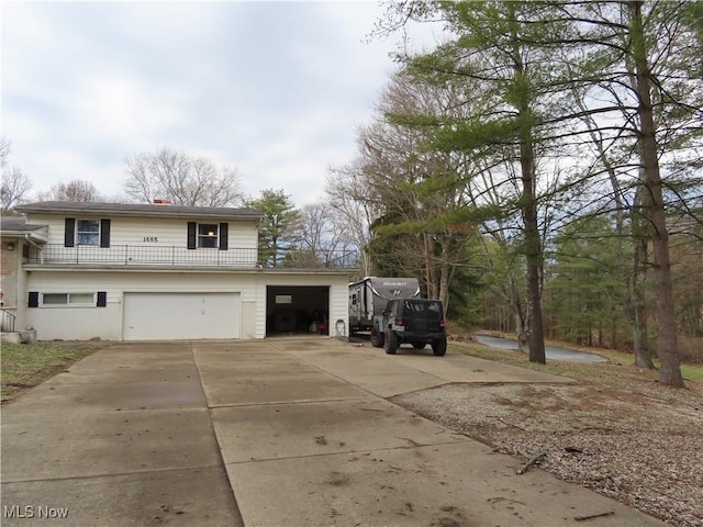 view of home's exterior with driveway