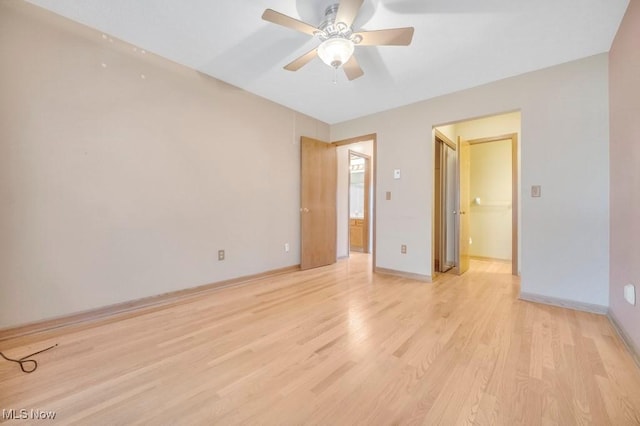 unfurnished bedroom with baseboards, ceiling fan, and light wood finished floors