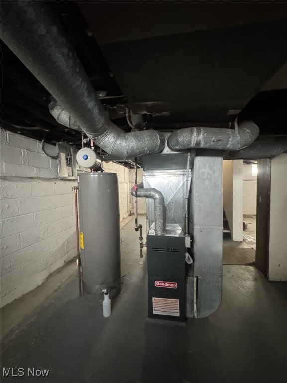 utility room with water heater