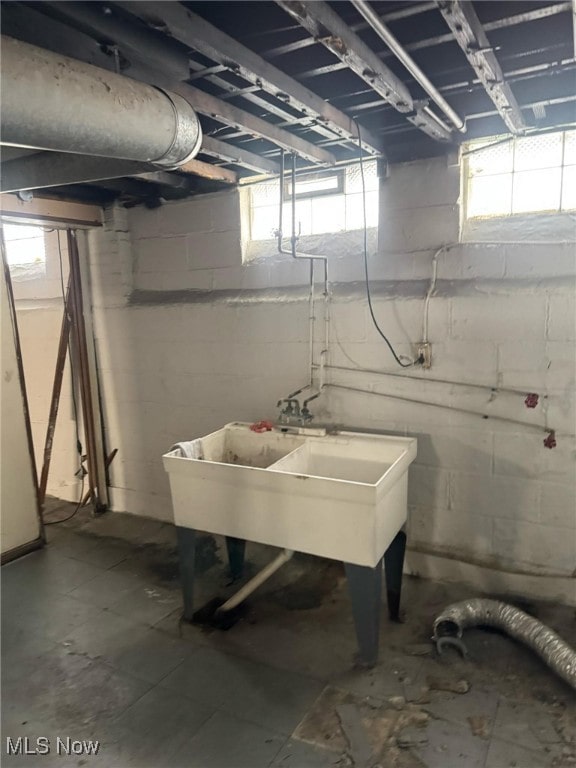 basement with a sink