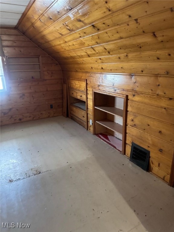 bonus room with wood ceiling and vaulted ceiling