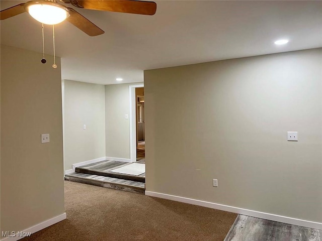 spare room featuring recessed lighting, carpet flooring, ceiling fan, and baseboards