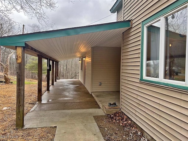 view of patio / terrace featuring a carport