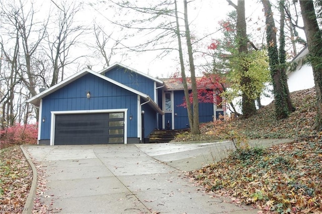 view of front of home featuring driveway and an attached garage