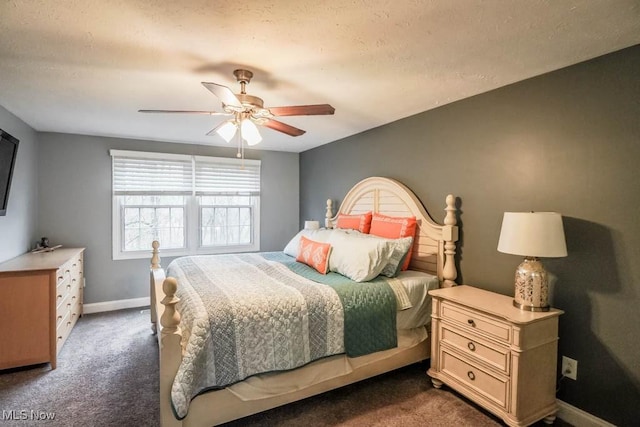 bedroom with dark colored carpet, ceiling fan, and baseboards