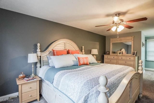 bedroom featuring carpet floors, ceiling fan, and baseboards