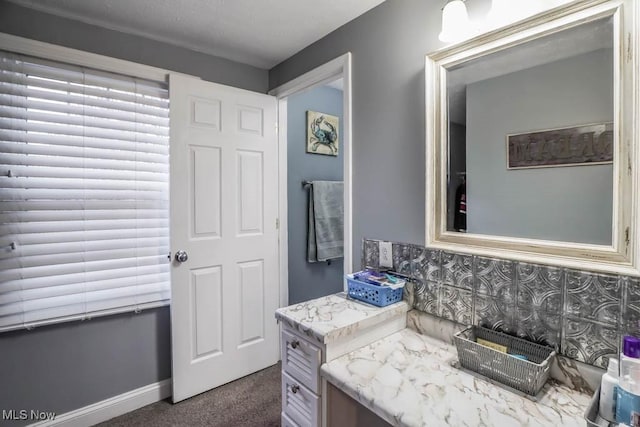 bathroom featuring baseboards