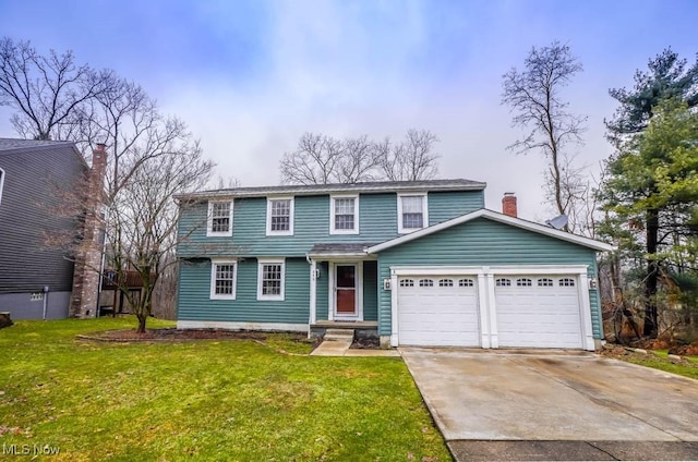 view of front of property featuring a garage, driveway, a chimney, and a front lawn