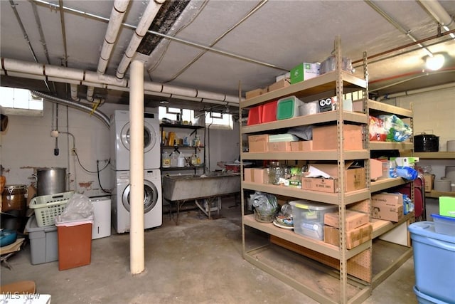 storage with a sink and stacked washer / drying machine