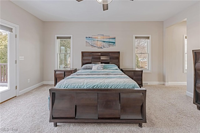 bedroom featuring carpet floors, access to exterior, baseboards, and a ceiling fan