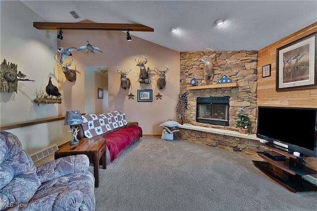 living room with lofted ceiling, visible vents, a fireplace, and carpet