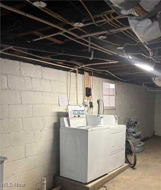 washroom with laundry area and separate washer and dryer