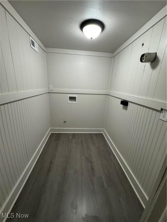 laundry area featuring laundry area, visible vents, washer hookup, and dark wood finished floors