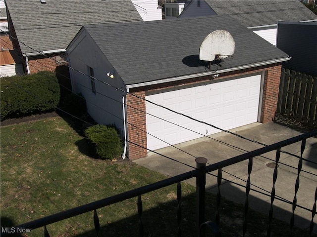 garage featuring fence