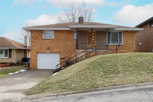 ranch-style house with an attached garage, brick siding, concrete driveway, a front lawn, and a chimney