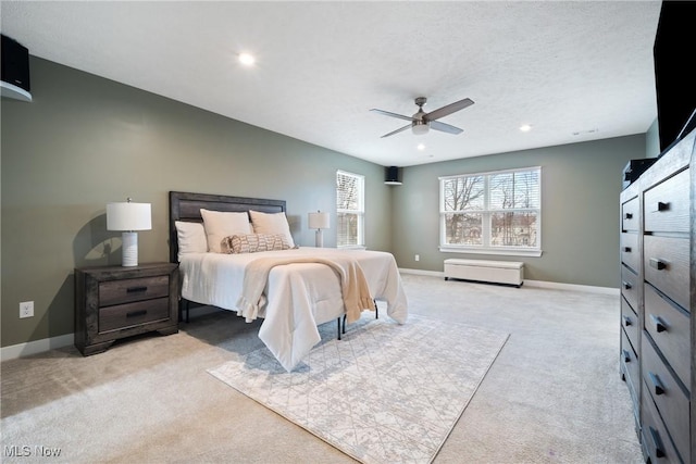 carpeted bedroom with ceiling fan, recessed lighting, and baseboards