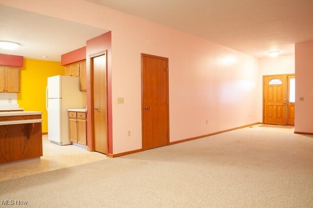 791 Beverly Ave, Canal Fulton, OH 44614 - interior space with baseboards and light colored carpet