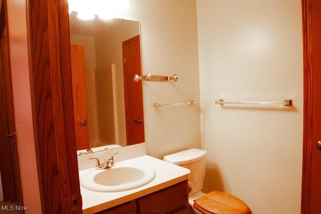 791 Beverly Ave, Canal Fulton, OH 44614 - bathroom featuring toilet and vanity