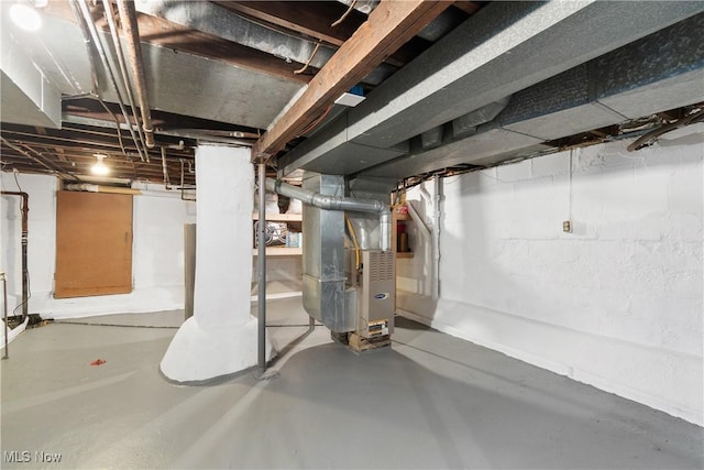 unfinished basement with heating unit