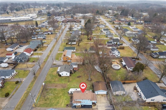 birds eye view of property with a residential view