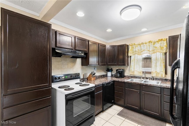 kitchen featuring light tile patterned floors, dark brown cabinetry, under cabinet range hood, a sink, and black appliances