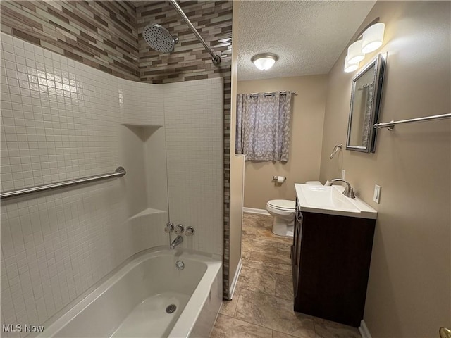 full bathroom featuring a textured ceiling, shower / tub combination, toilet, vanity, and baseboards