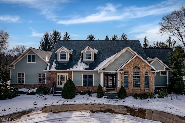 view of front of house with brick siding