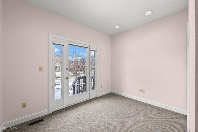 interior space with carpet floors, recessed lighting, visible vents, and baseboards