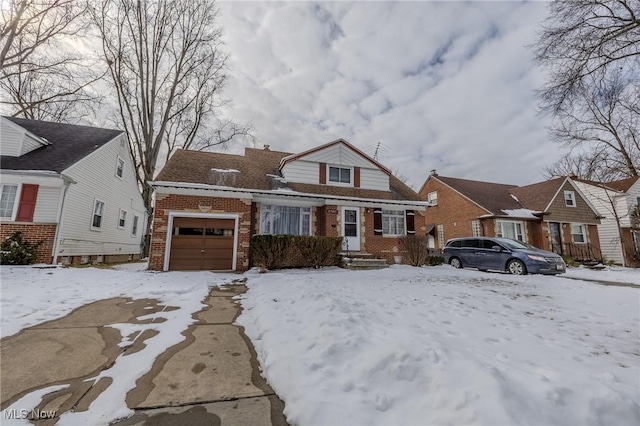 view of front of property with brick siding and an attached garage