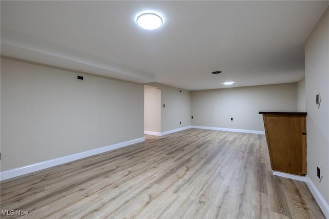 interior space with light wood-type flooring and baseboards