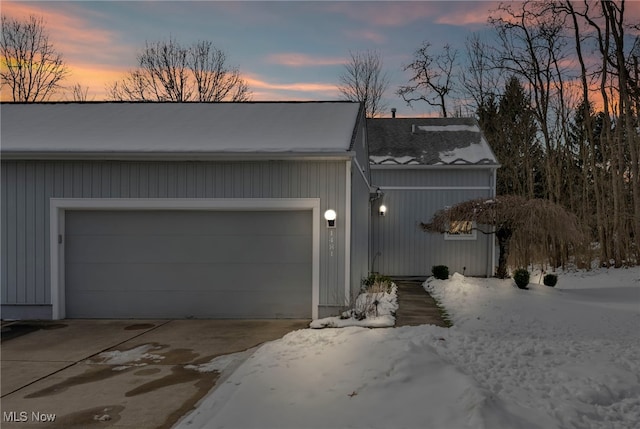 exterior space with a garage and driveway