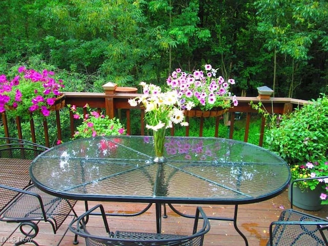 balcony featuring outdoor dining area