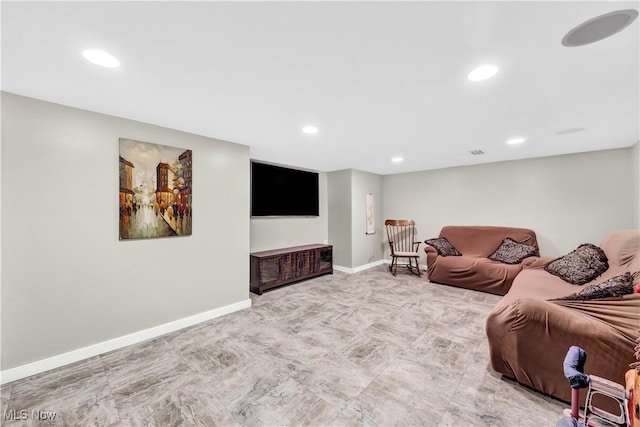 living area featuring visible vents, baseboards, and recessed lighting