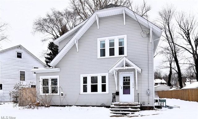 view of front of house with fence