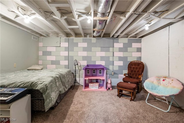 carpeted bedroom featuring visible vents