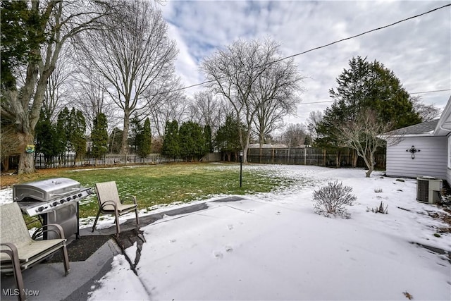 exterior space featuring a patio, a fenced backyard, and central air condition unit