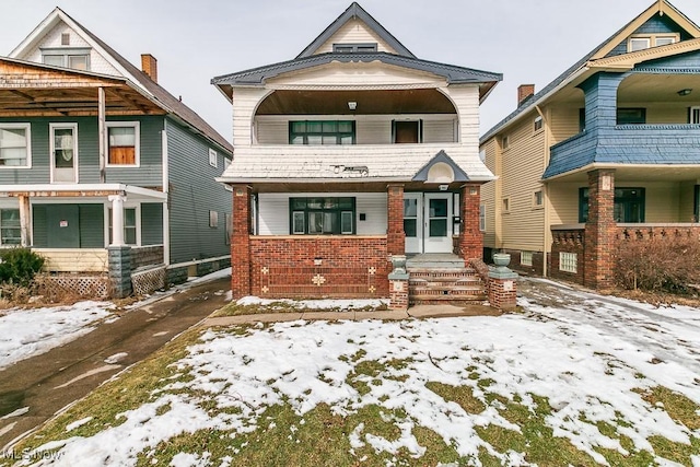 view of front of house featuring brick siding