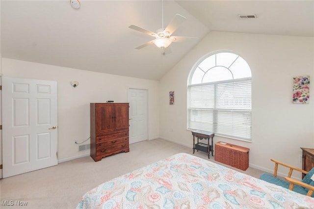 bedroom with lofted ceiling, light carpet, visible vents, and baseboards